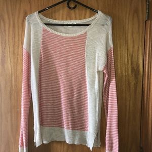 Oatmeal and orange colored sweater